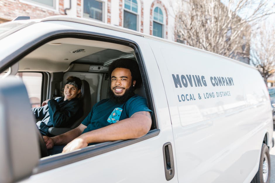Smiling moving company team ready to assist